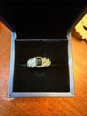 Gold-Tone Women's Ring with Black Center Stone and Decorative Accents